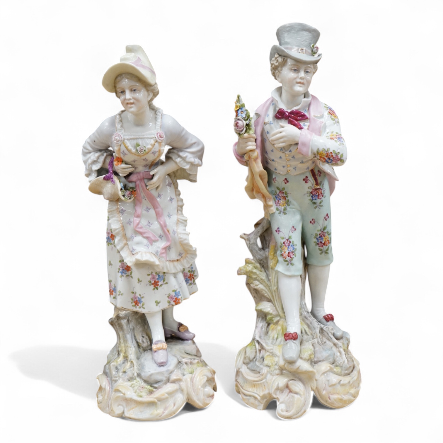 A pair of large Continental porcelain figures of a lady and gentleman, late 19th century, 41cm high